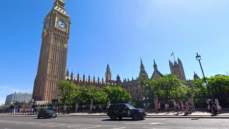 vehicles and pedestrians near big ben, london