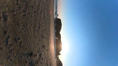 Mobile-shot-of-a-sea-cave-on-Bandon-Beach-as-the-sunsets