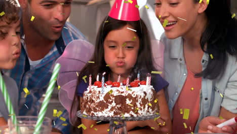 blowing out candles on birthday cake, girl surrounded by family and confetti animation