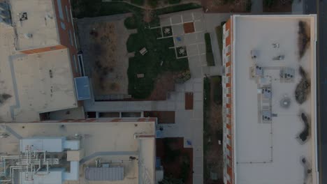 aerial top-down view over buildings rooftops of durham downtown in north carolina