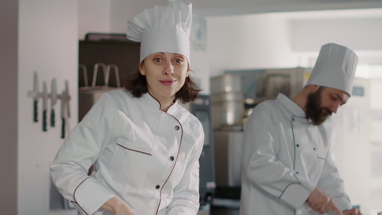 Portrait of female chef preparing celery ingredients for food dish