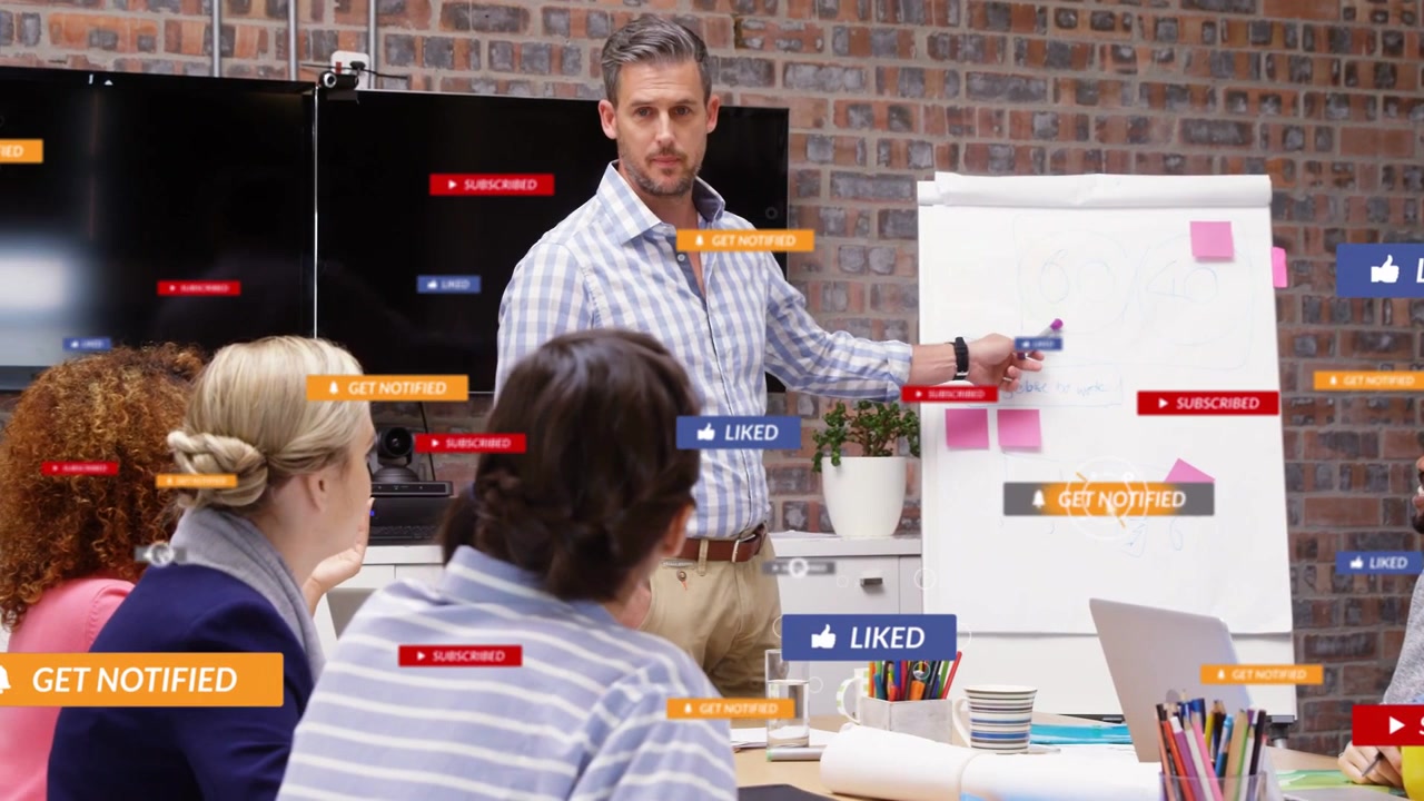 Presenter pointing at flipchart pink notes, causing social alerts and engaging team in marketing