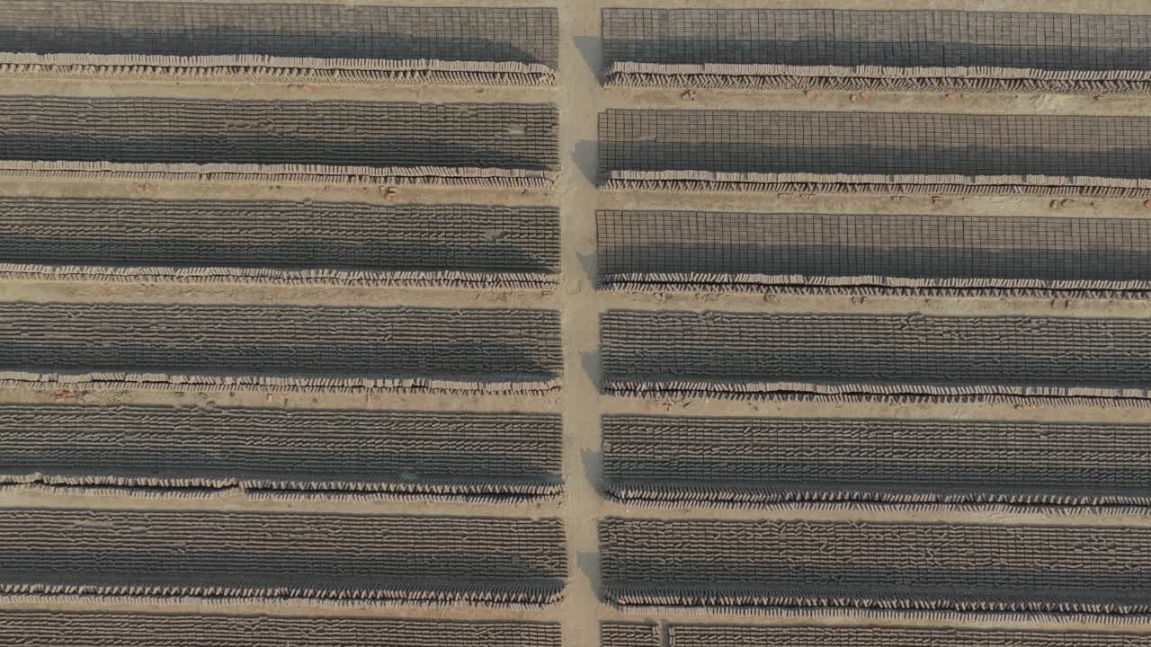 Drone view of drying bricks arranged at traditional brick factory in Bangladesh