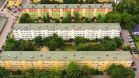 Drone-view-of-long-residential-building-,-aerial-view-summer-time