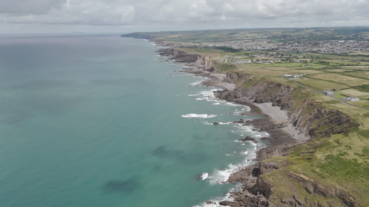 Aerial View of Stunning Coastline with Cliffs and Waves