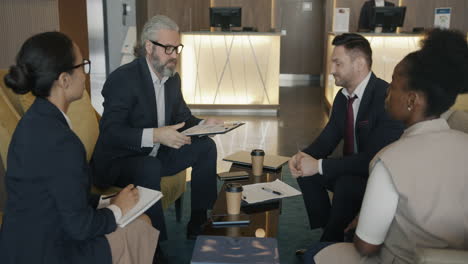 business meeting in hotel lobby