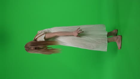 Ghostly Figure in White Dress on Green Screen