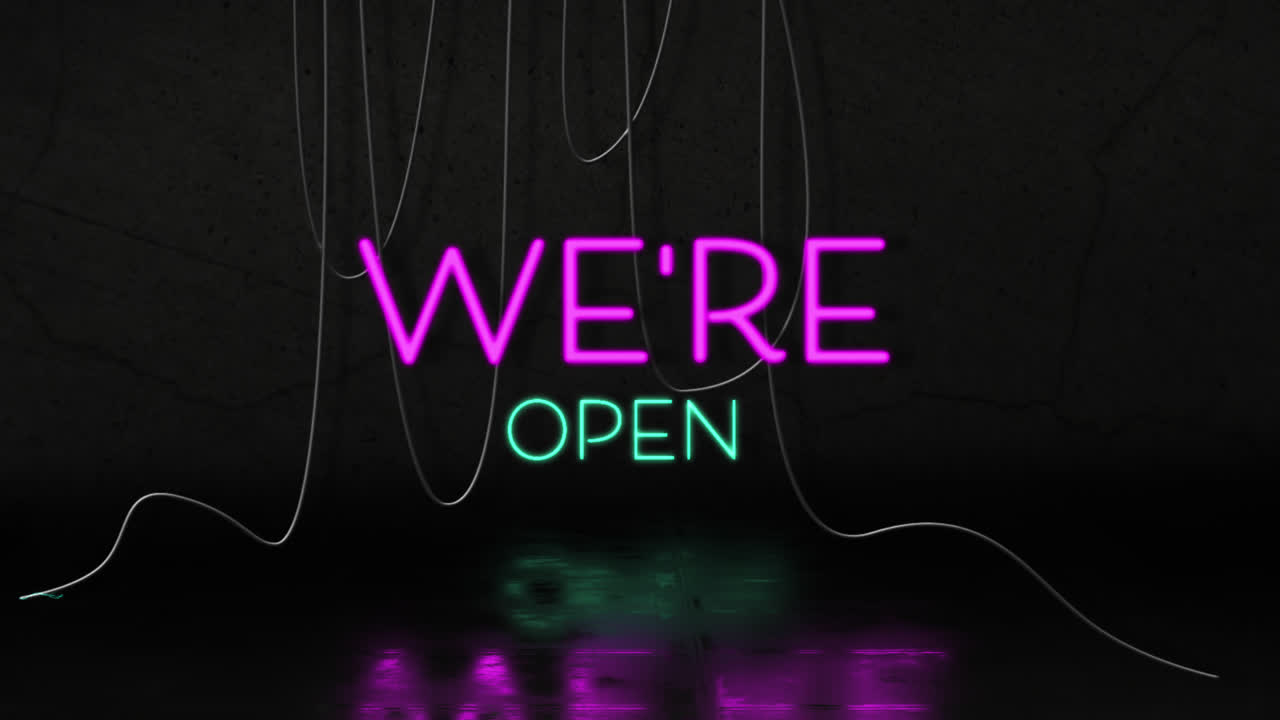 Animation of we're open text in pink and blue neon, with hanging cables on black background