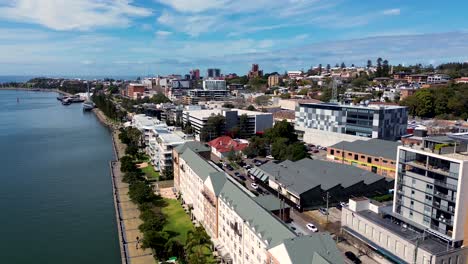 drone aerial landscape pan cbd honeysuckle drive commercial urban city travel tourism buildings location newcastle harbour nsw australia 4k