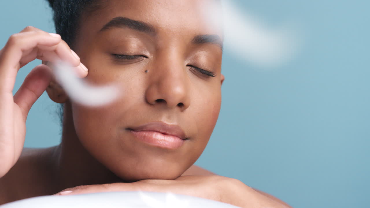 Skincare, beauty and feather soft face care