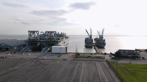 Excellent-Aerial-View-Approaching-Ships-Docked-At-The-Newport-News-Shipyard-In-Virginia