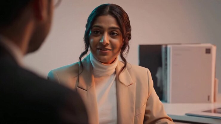 Engaging Conversation: A Professional Discussion Between Colleagues in a Modern Workspace Setting with Thoughtful Expressions and Attentive Body Language