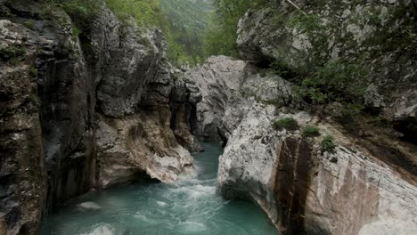 shot through a canyon with blue water