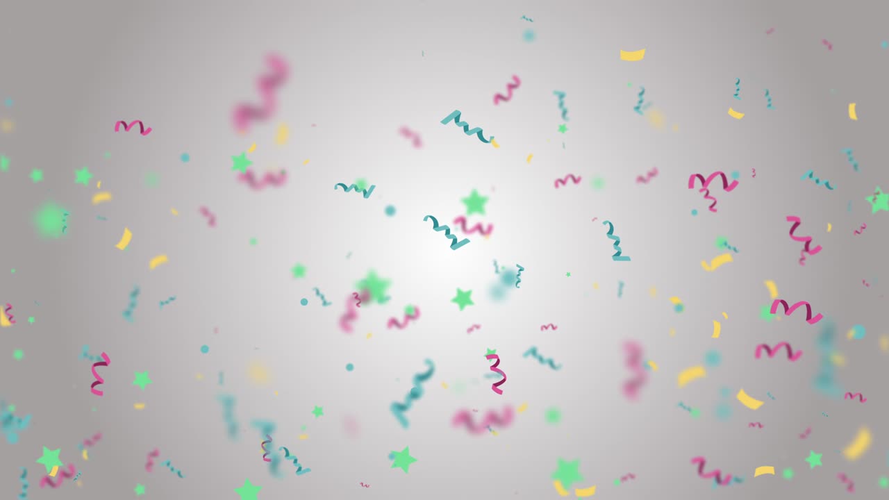 Colorful Confetti Falling Down in Slow Motion Over light Background.