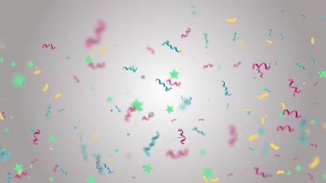 Colorful Confetti Falling Down in Slow Motion Over light Background.