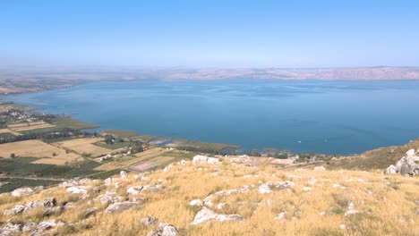 the beautiful blue sea of galilee from the rocky arbel cliff mountain - wide rolling