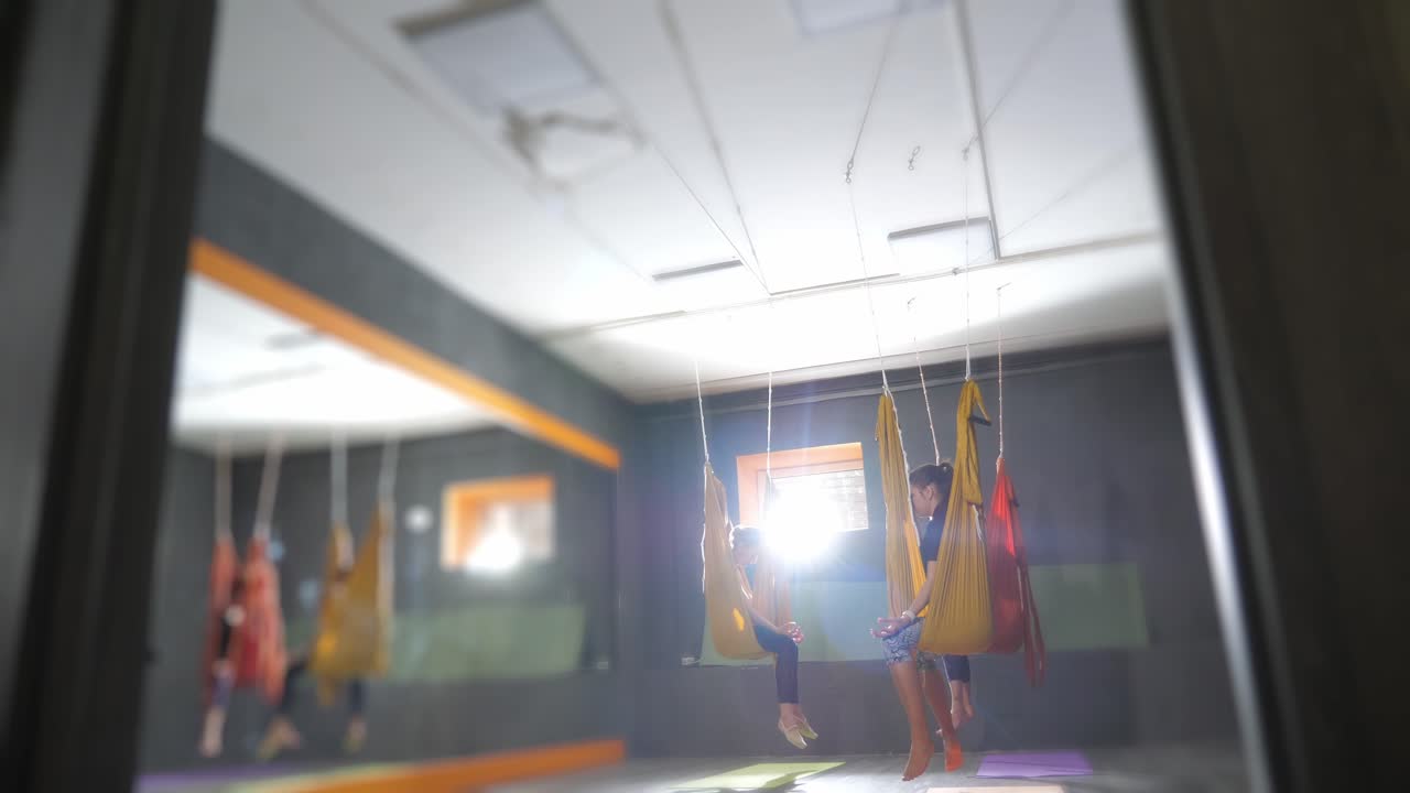 Aerial Yoga Class in a Studio