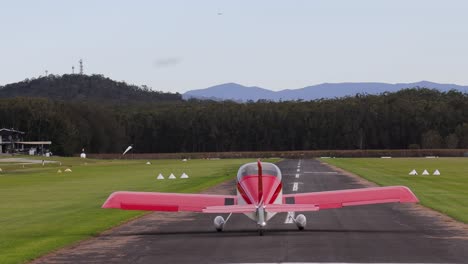 sequence of a small plane taking off into the sky