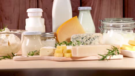 various dairy items displayed on a wooden surface