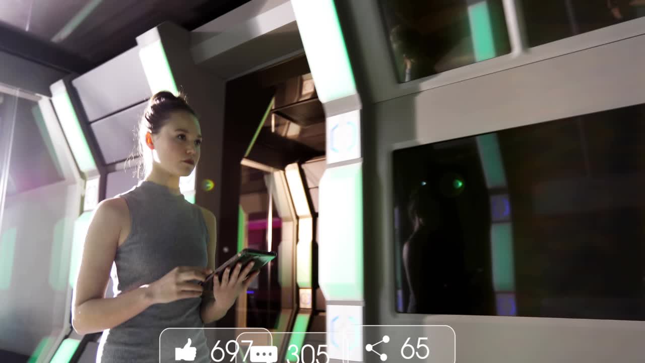 Woman tapping tablet checking feed walking tech corridor raising AR icons person passing shadowing