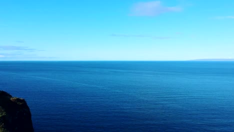 dolly forward off the coast of isle of skye showing the atlantic ocean channel