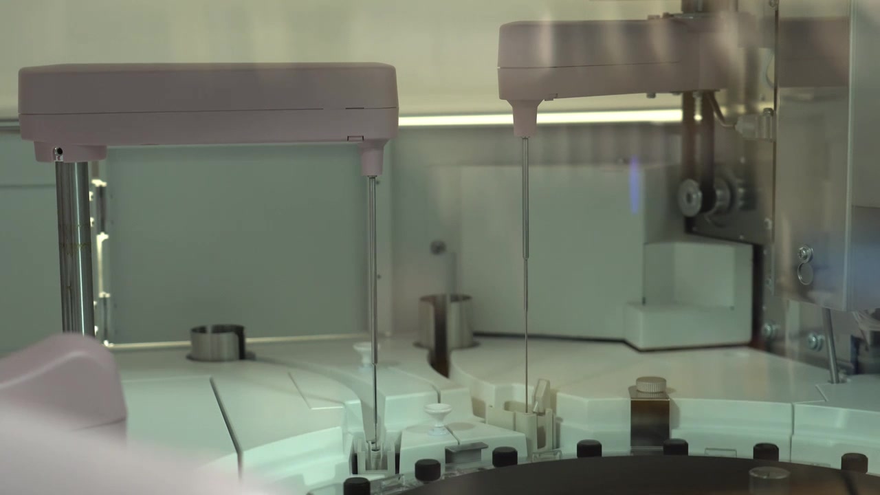 Advanced laboratory equipment processes samples for clinical analysis in a sterile environment
