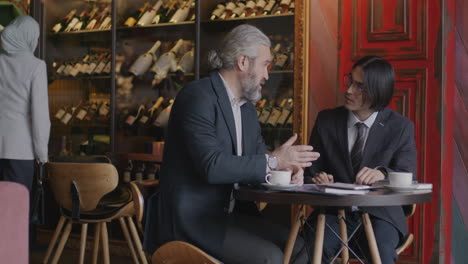 business meeting in a wine bar