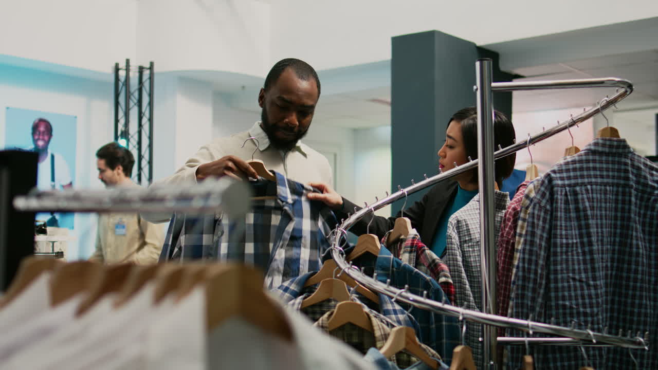 People shopping in a clothing store