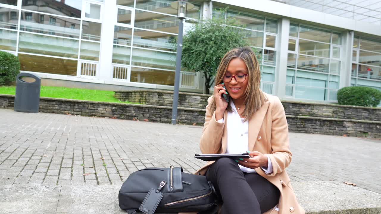 Businesswoman on a Phone Call in an Urban Setting