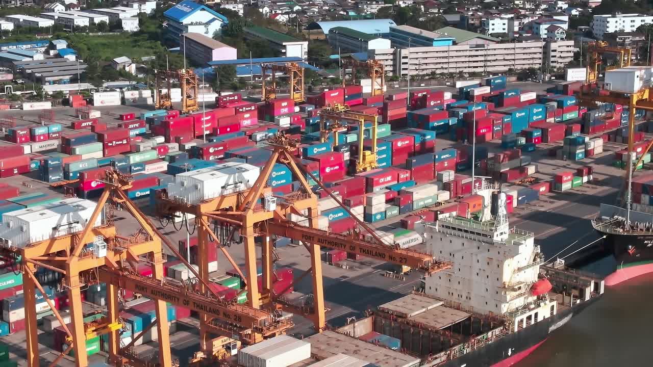 Cargo activity in a busy port area in Bangkok, Thailand during daylight