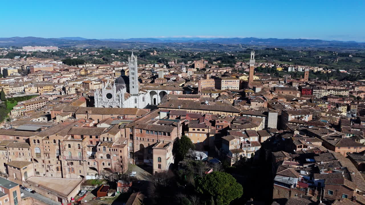 Siena, italy, showcasing the historic duomo di siena under a clear sky, aerial view