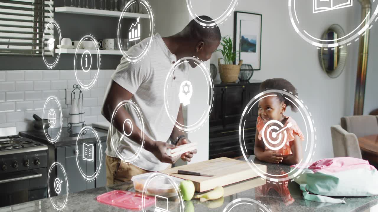 Father preparing sandwich, packing lunch for school while daughter watching, icons overlaying frame