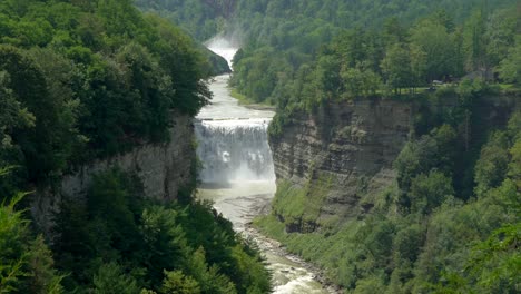 the middle falls in the letchworth state park in the green of summer