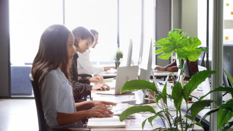 business colleagues working at desk 4k