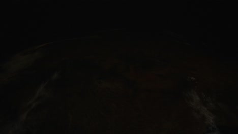 un lapso de tiempo de la tierra a medida que pasan los días y las noches, como se ve desde lo alto en órbita