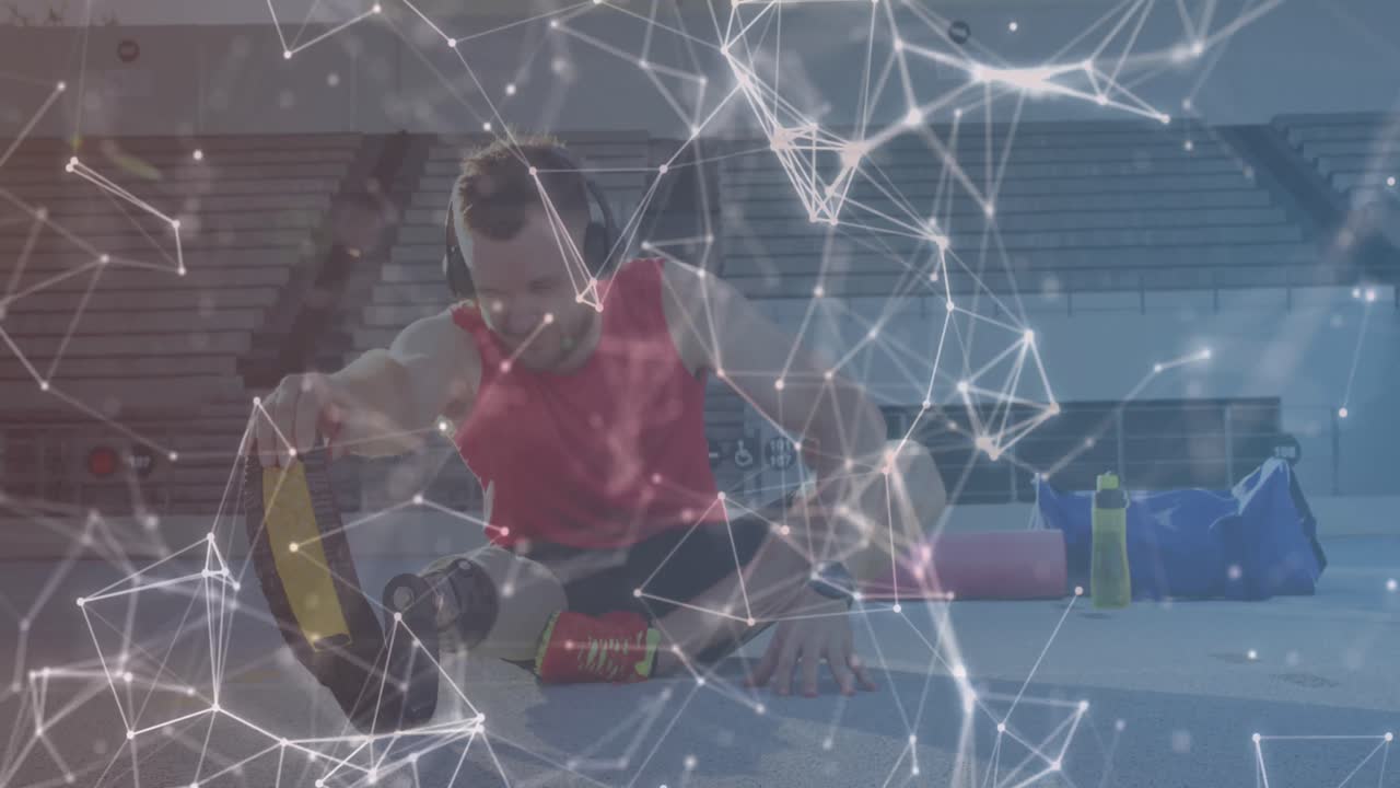 Animation of geometrical shapes over caucasian male with running blade stretching before training