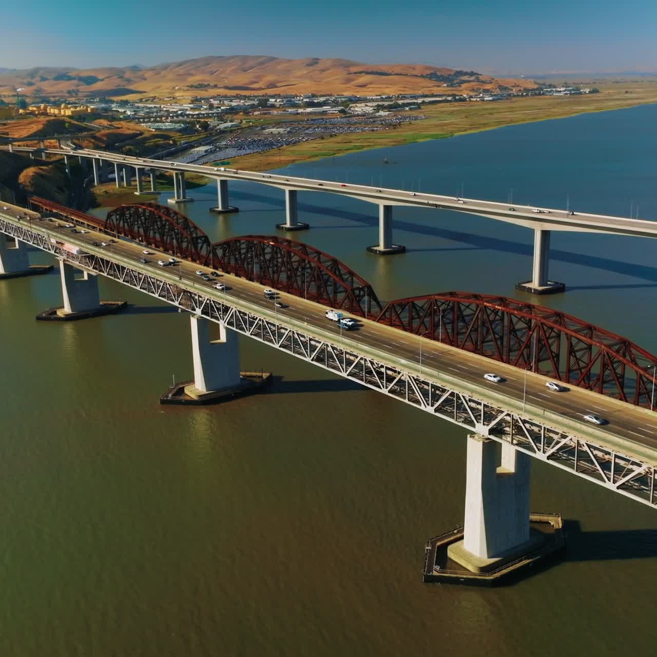 Bridges with highways to both sides. Roads on bridges connecting Martinez to Benicia. Sunny day view from top