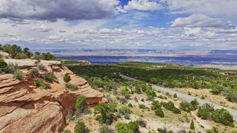 Drone-flyby-of-beautiful-Grand-Valley-vista-with-nice-rock-structure-in-foreground