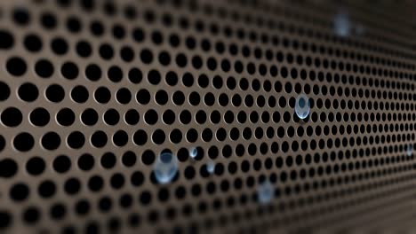 circle perforated sheet metal with drops of water video