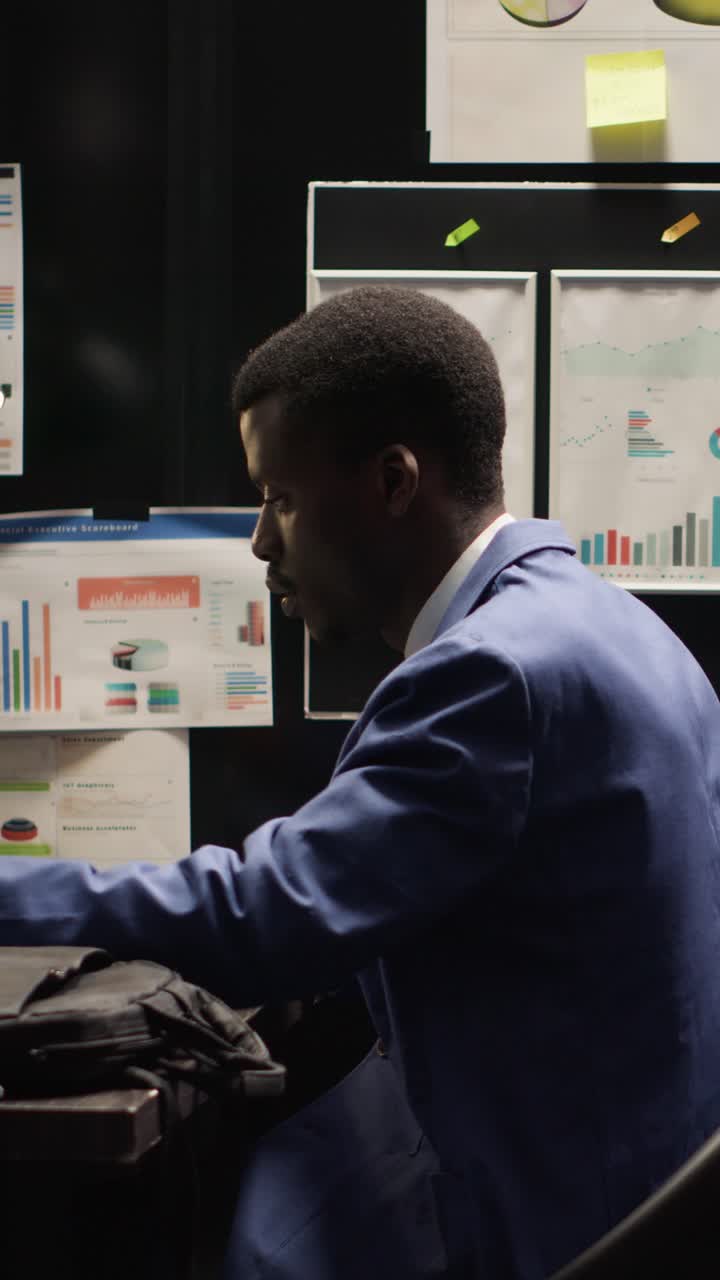 Man in Suit Working in Office