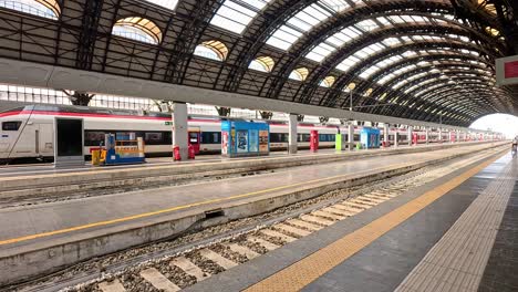 a train departs from milan central station