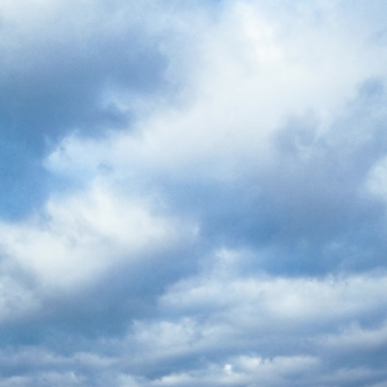 Clouds flowing on blue sky. Summer beautiful outdoor cloudy sky