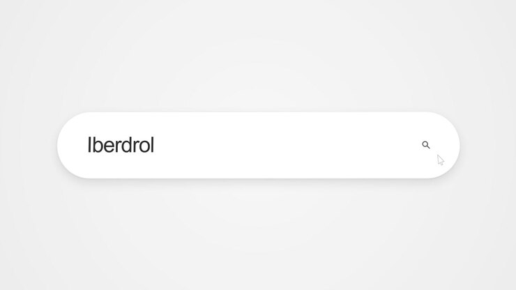 Text being typed into a web browser search bar, spelling out Iberdrola for an online search