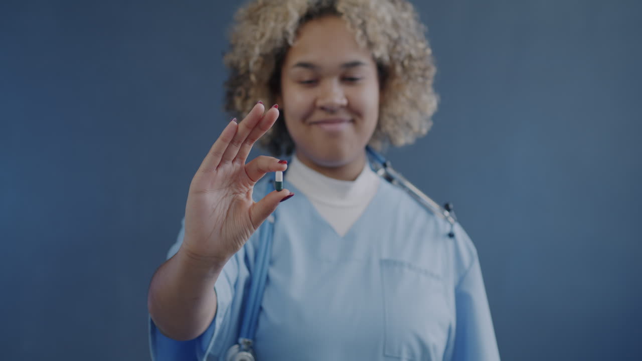 Nurse Holding a Pill