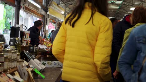 markets of provence - food stall at crowded market in antibes, france. static shot