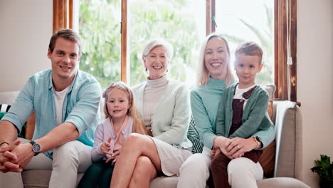 family, face and smile on sofa with love