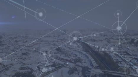 animación de la red de conexiones frente a una vista aérea del paisaje invernal