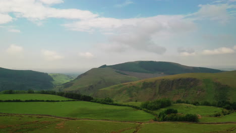 Aerial-rising-shot-of-the-mountains-in-the-English-Lake-District,-on-a-bright-sunny-day