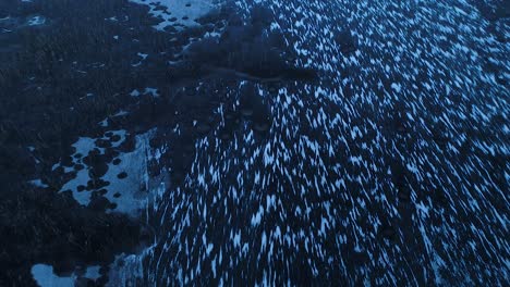 Super-cold-frozen-lake-in-evening-sunset-blue-light