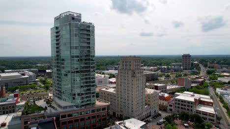 modern-buildings-in-durham-nc,-north-carolina,-the-old-and-the-new-aerial-orbit